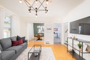 Bright and beautiful living room with smart TV for streaming your favorite shows and movies