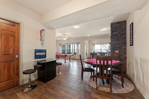 Large downstairs living room with plenty of fun games