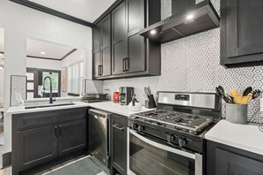 A sleek kitchen where every meal preparation feels like a pleasure.
