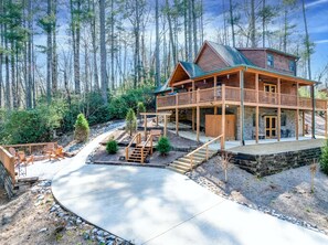 View of  Hilltop Haven outdoor firepit & chairs  on left of slide