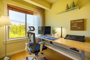 One of the standout features of this house is the dedicated working station on the 2nd floor, equipped with an ergonomic desk and chair, allowing you to stay productive