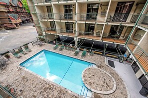 The view of the community swimming pool from the balcony.