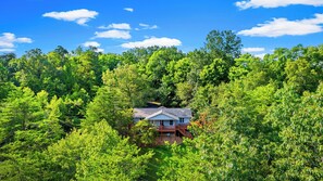 An aerial view of the cabin. Enjoy plenty of privacy in this peaceful Smoky Mountain cabin.