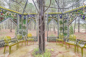 Shared Gardens/Chapel | Private Screened-In Patio | Private Outdoor Dining Area