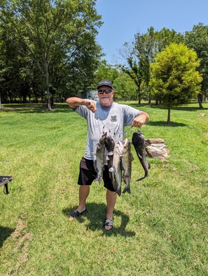 Guest with a nice stinger of Chanel Catfish from our pond!