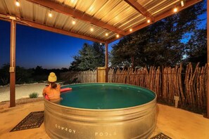 Take a dip in the heated Cowboy Pool!
