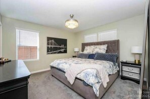 Spacious Master bedroom with walk in closet and bathroom connected.