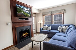 Unwind by the cozy gas fireplace while enjoying your favorite show on the TV!
