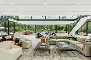Spacious living room, perfect for group gatherings and cozy nights in.