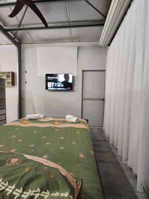 Queen size bed with smart with & door .