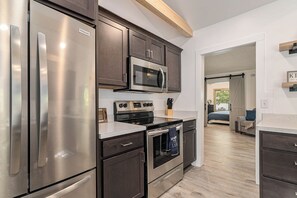 Kitchen with a view to the living room