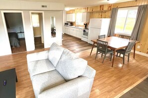 Living, dining, and kitchen area