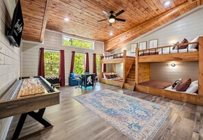 This area highlight a spacious bunk room, ideal for family stays or group retreats.