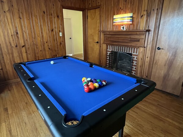 Game Room. Pool table & board games. 