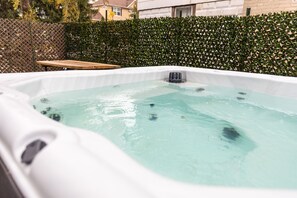 Enjoy a Soothing Soak in the Private Hot Tub