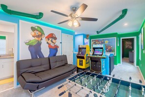 Game room with a Mario Cart theme. 