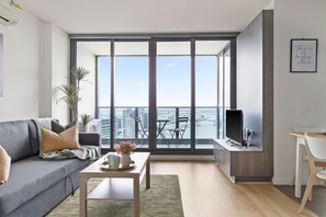 The living area with a 3-seater sofa bed that folds out to a double.
