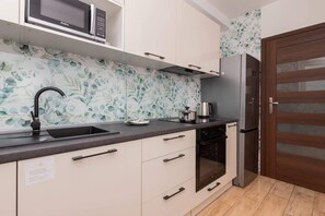 Separate kitchen with a dining area