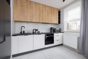 Kitchenette with a dishwasher