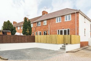Off street parking for two cars, and entrance to the property