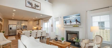 Enjoy a perfect view of the cathedral ceilings and the second-floor loft overlooking the living area.