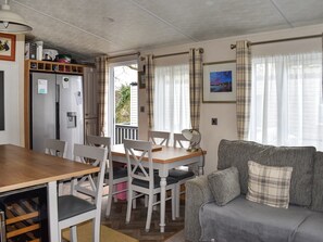 Open plan living space | Sunset Lodge, Sandown