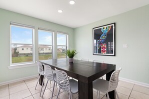 Dining area; sunny, bright modern and fresh feel.
