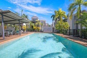 Make a splash within the sparkling swimming pool, shared amongst the building's residents.
