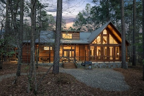 Not Today Cabin rear elevation at twilight.
