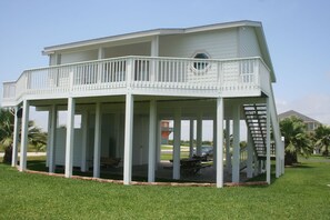 Deck with views, open space under house with porch swing and picnic table.