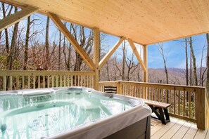 Take in the Mountain Views from the Covered Hot Tub Deck