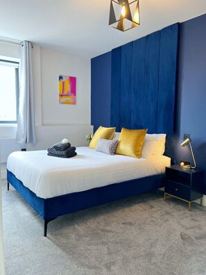 King size velvet bed with hybrid memory foam mattress.