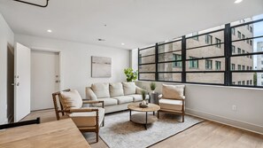 Living Room with Comfortable Seating + Smart TV