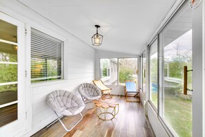 House Exterior | Screened Sunroom