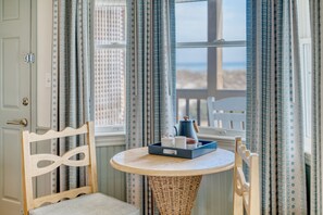 Savor quiet moments and scenic views at a cozy table made for morning light and evening wine.