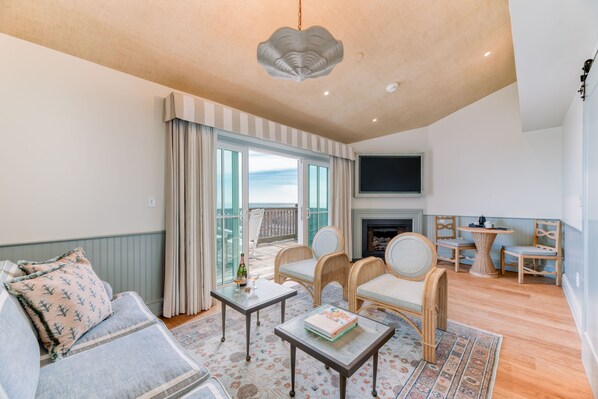 Gather in effortless comfort where soft tones, open space, and natural light create a perfect place to connect.