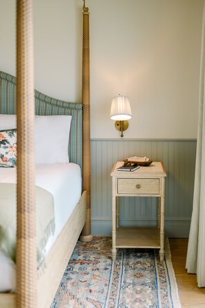 A softly lit bedside moment where every detail invites you to slow down and savor the quiet.