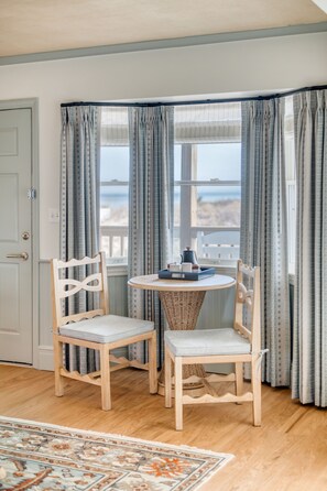 Soak in soft light and water views from a cozy corner that invites quiet mornings and unhurried evenings.