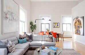 Main living space with 20' ceilings and abundant light