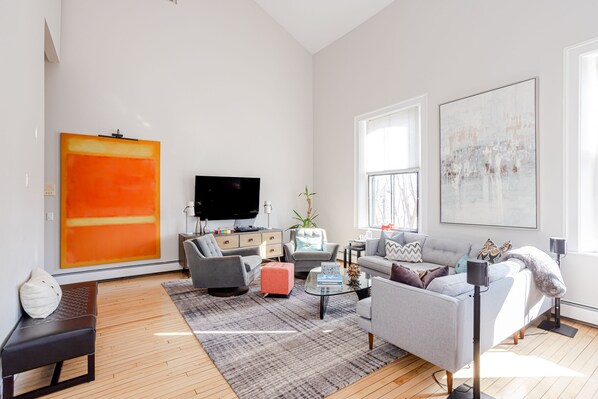 Main living space with 20' ceilings and abundant light