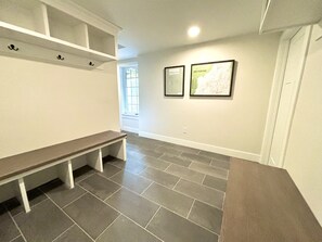 Mudroom off driveway level