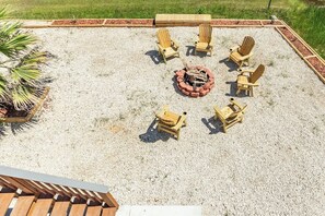 This fire pit is perfect for year round hangouts by the fire.  Post beach smores anyone?