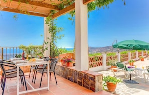 Casa Paqui%2C shaded terrace with great views of the sea%2E
