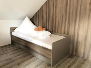 Basic Dreibettzimmer mit Gemeinschaftsbad