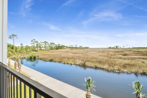 Escape to the serenity of nature where the sky meets the vibrant marshland, inviting a moment of tranquility and reflection.