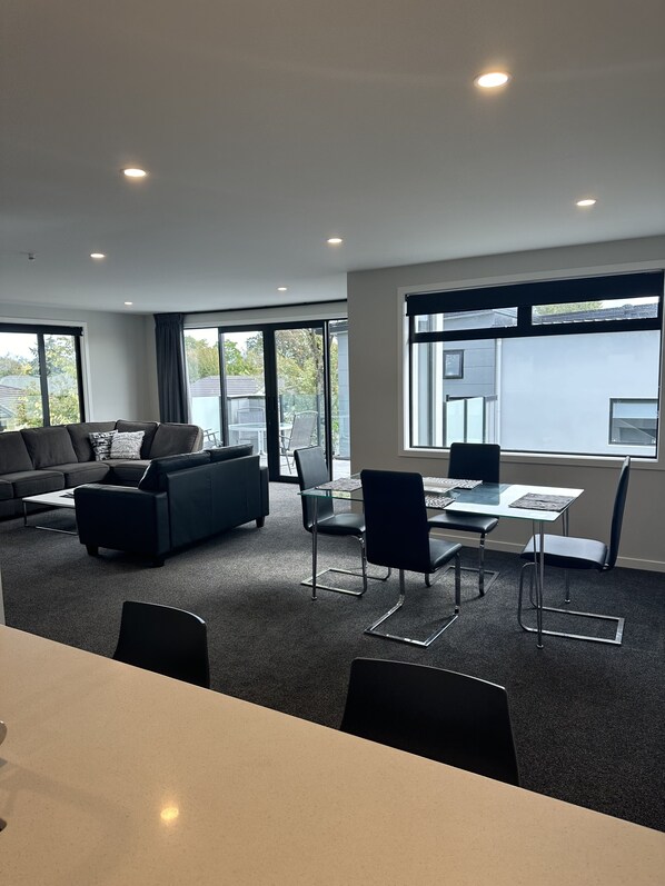 Open plan living area looking out onto patio