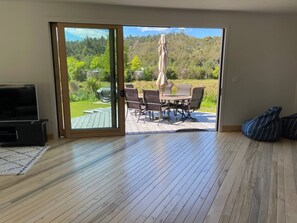 Looking out onto the deck from the living area