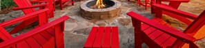 Gather around the fire pit for cozy evening conversations and enjoy the warmth under the night sky.