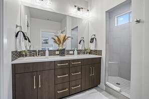 Ensuite master bathroom with a shower