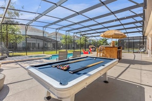 Poolside lounge with billiards table